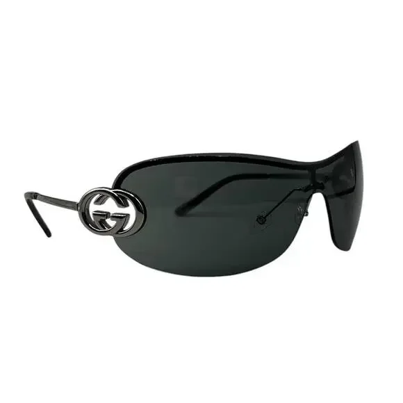 Gucci Women's' Oval Frame Sunglasses in Black | LN-CC® archive